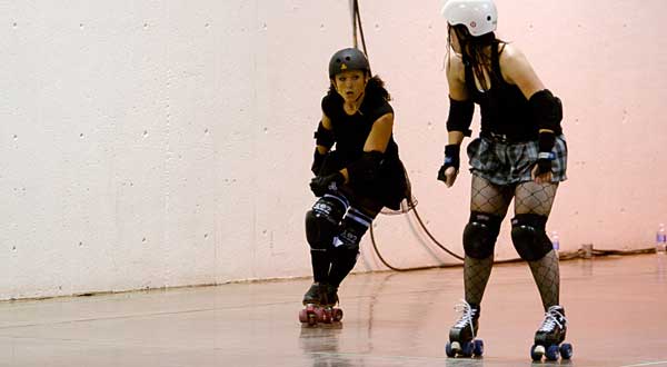  elements of hockey, football and NASCAR along with girls in spandex.